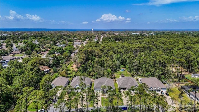 aerial view with a residential view and a wooded view