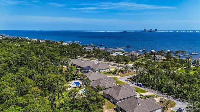 bird's eye view featuring a residential view and a water view