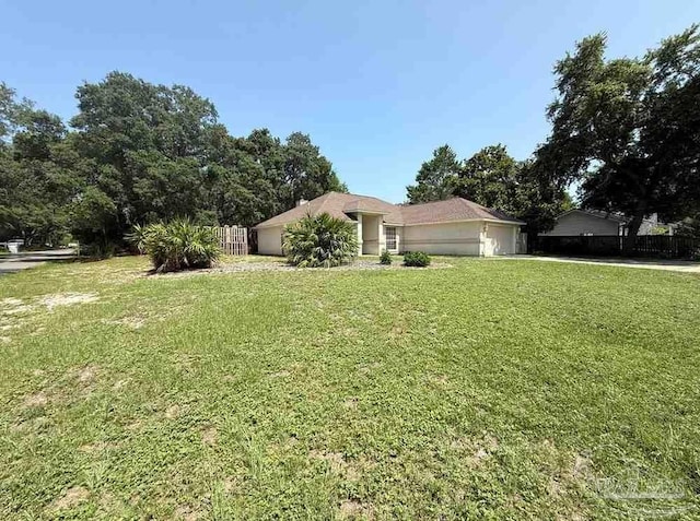 1640 Steven Dr, Gulf Breeze, FL 32563 - view of front of house with a garage