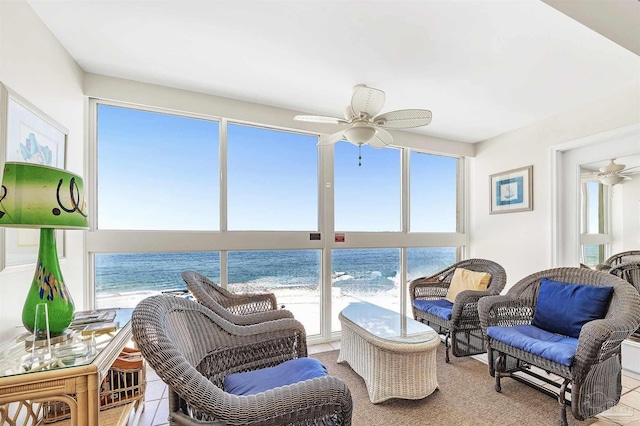 1007 W Beach Blvd Unit 53, Gulf Shores, AL 36542 - sunroom / solarium featuring healthy amount of natural light and view of water and beach