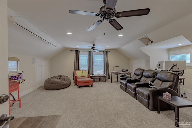 carpeted cinema room featuring a ceiling fan, baseboards, vaulted ceiling, and recessed lighting