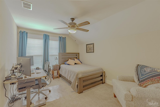 bedroom with vaulted ceiling, baseboards, carpet floors, visible vents, and a ceiling fan
