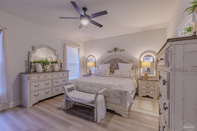 bedroom featuring ceiling fan and light hardwood / wood-style floors