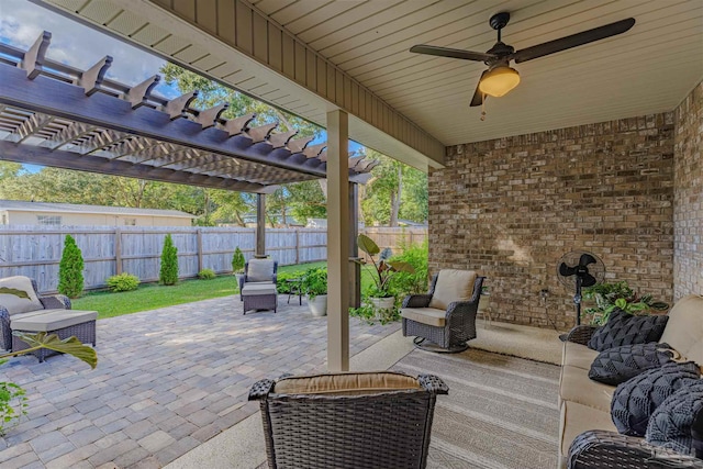 view of patio with ceiling fan and a pergola