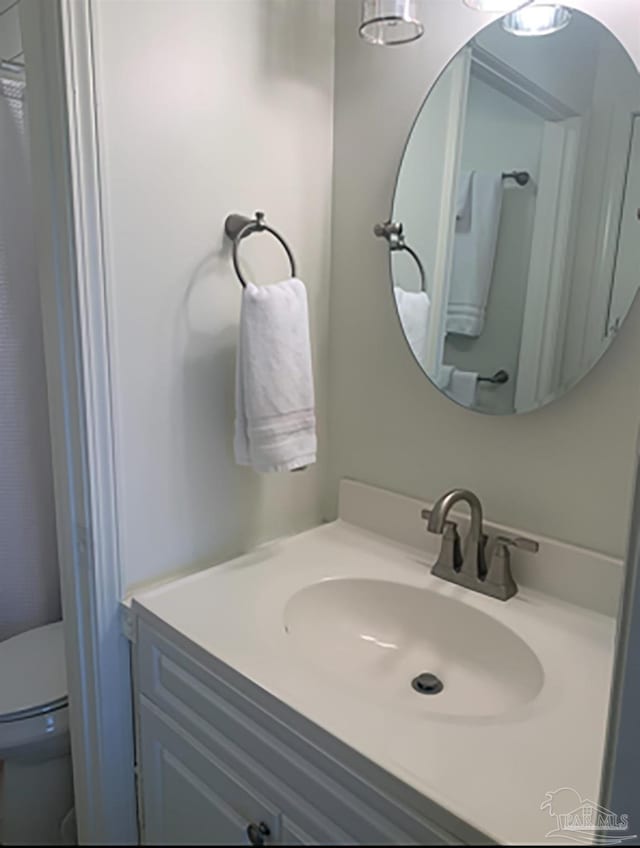 16310 Perdido Key Dr Unit 13A, Pensacola, FL 32507 - bathroom featuring vanity and toilet