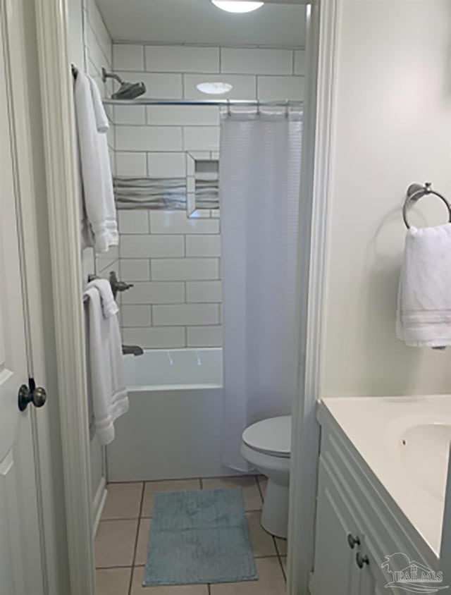 16310 Perdido Key Dr Unit 13A, Pensacola, FL 32507 - full bathroom featuring tile patterned flooring, toilet, vanity, and shower / bathtub combination with curtain