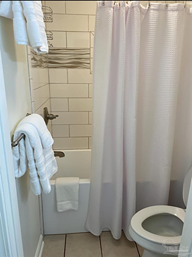 16310 Perdido Key Dr Unit 13A, Pensacola, FL 32507 - full bath with tile patterned floors, toilet, and shower / bath combo with shower curtain