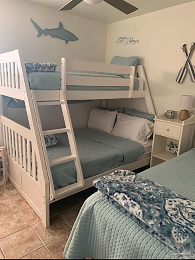 16310 Perdido Key Dr Unit 13A, Pensacola, FL 32507 - bedroom featuring tile patterned floors and a ceiling fan