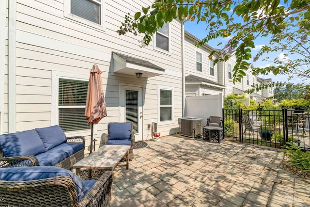 view of patio featuring an outdoor hangout area and central AC