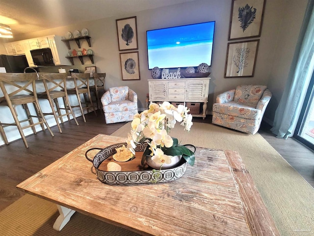 living area with wood finished floors