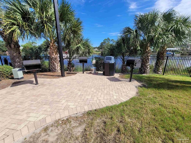 view of patio featuring fence