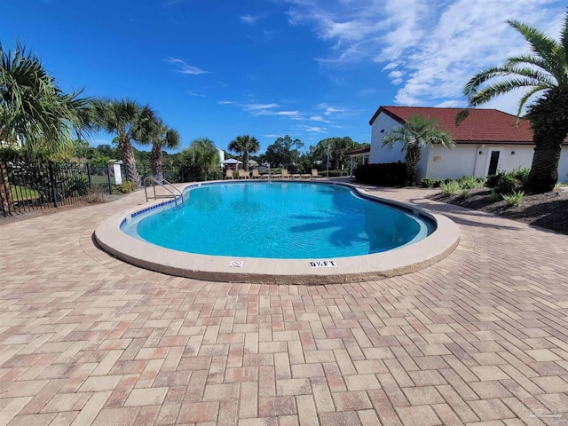 pool featuring fence