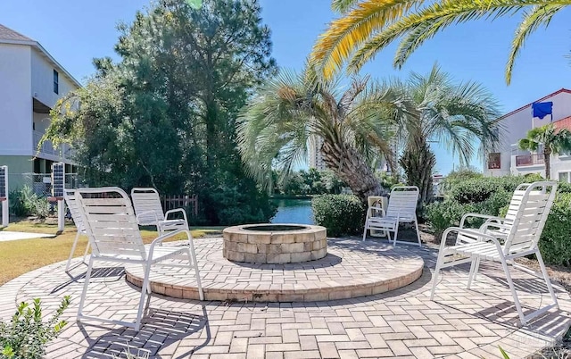 view of patio / terrace with a fire pit