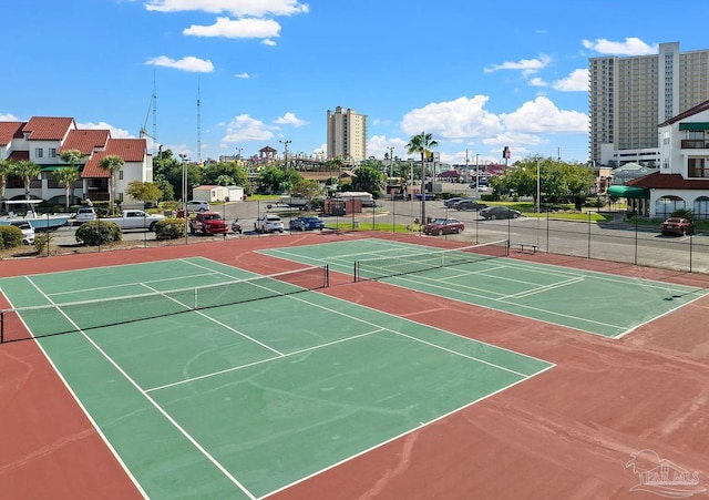 view of sport court featuring community basketball court and fence