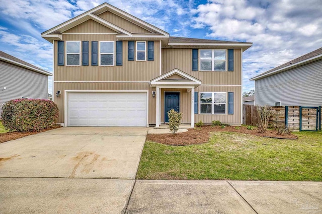 view of front of home with driveway, an attached garage, fence, and a front lawn