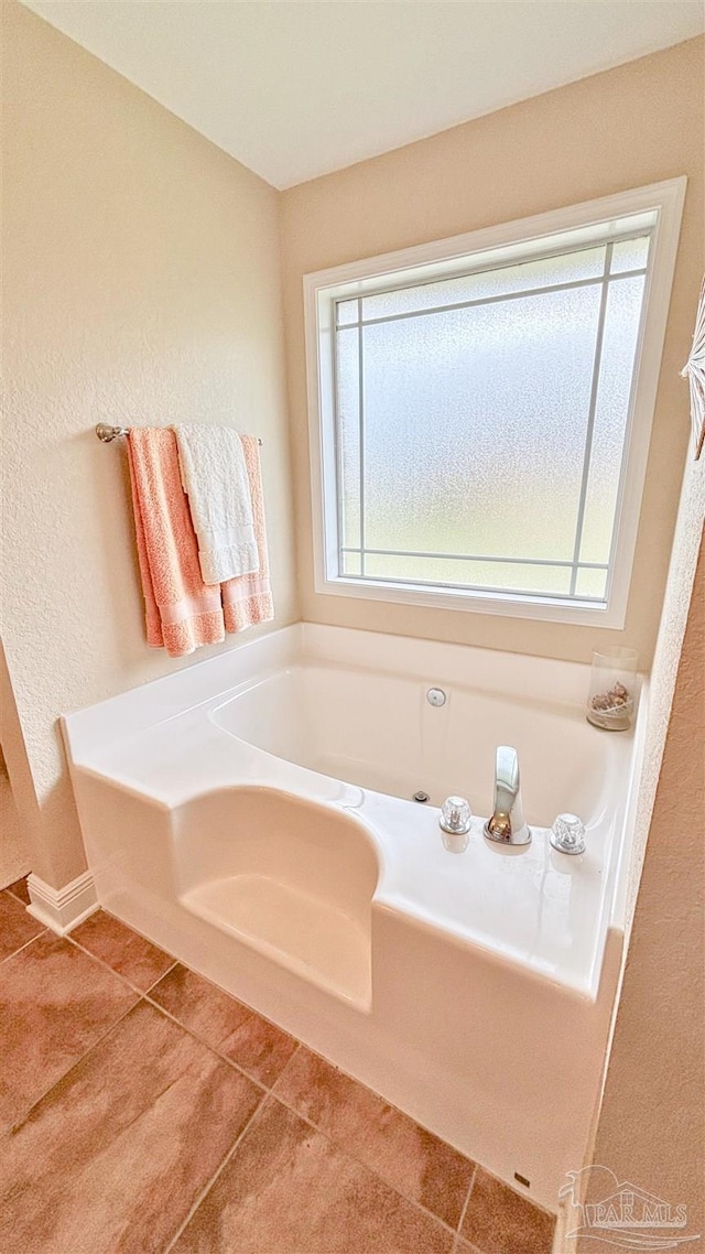6214 Plum Orchard Way, Crestview, FL 32536 - full bathroom featuring plenty of natural light, a garden tub, and tile patterned flooring