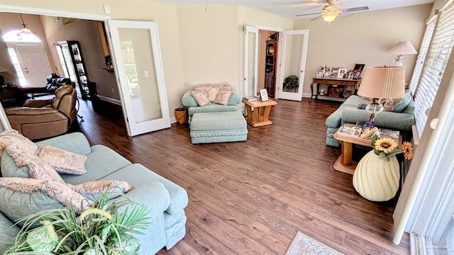 6214 Plum Orchard Way, Crestview, FL 32536 - living area featuring a ceiling fan, wood finished floors, and baseboards