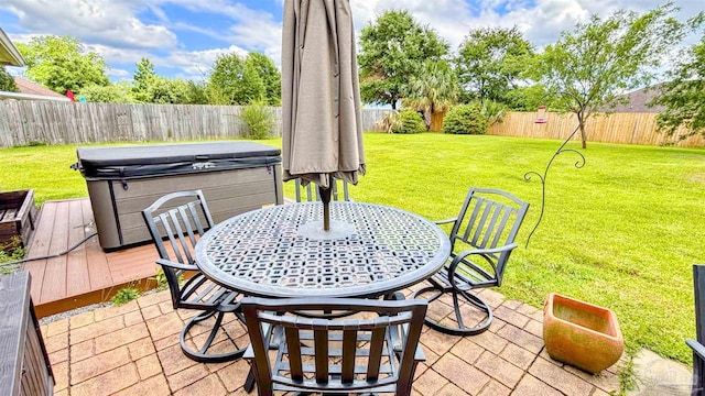 6214 Plum Orchard Way, Crestview, FL 32536 - view of patio with a hot tub and outdoor dining space