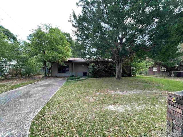 view of front of home with a front lawn