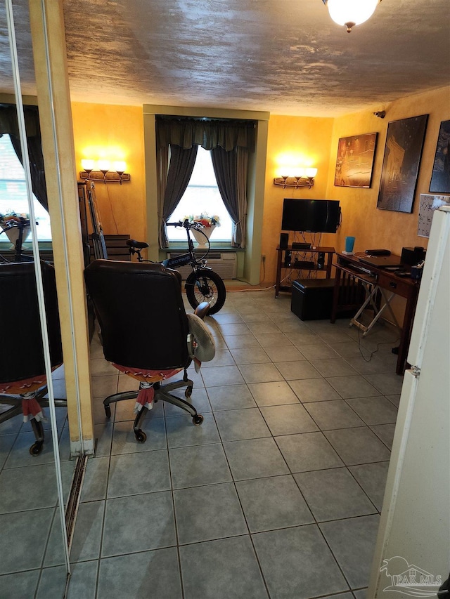 224 E Garden St Unit 306, Pensacola, FL 32502 - tiled home office with a textured ceiling