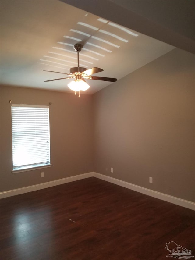 2201 Scenic Hwy Unit E-7, Pensacola, FL 32503 - empty room featuring dark wood finished floors, ceiling fan, and baseboards