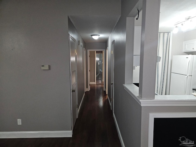 2201 Scenic Hwy Unit E-7, Pensacola, FL 32503 - hallway featuring dark wood-type flooring and baseboards