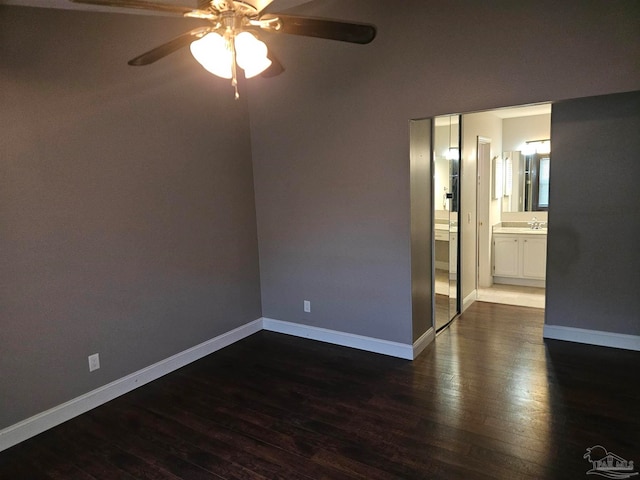 2201 Scenic Hwy Unit E-7, Pensacola, FL 32503 - unfurnished room with ceiling fan, dark wood-style flooring, and baseboards