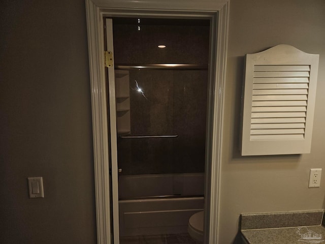 2201 Scenic Hwy Unit E-7, Pensacola, FL 32503 - full bathroom with toilet, combined bath / shower with glass door, and vanity