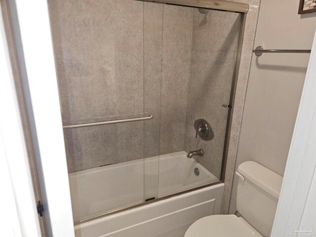 2201 Scenic Hwy Unit E-7, Pensacola, FL 32503 - bathroom with toilet and shower / bath combination with glass door