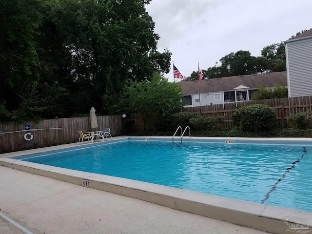 2201 Scenic Hwy Unit E-7, Pensacola, FL 32503 - community pool featuring a fenced backyard