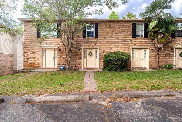 1314 Foxborough Dr, Pensacola, FL 32514 - view of front of property featuring brick siding and a front yard