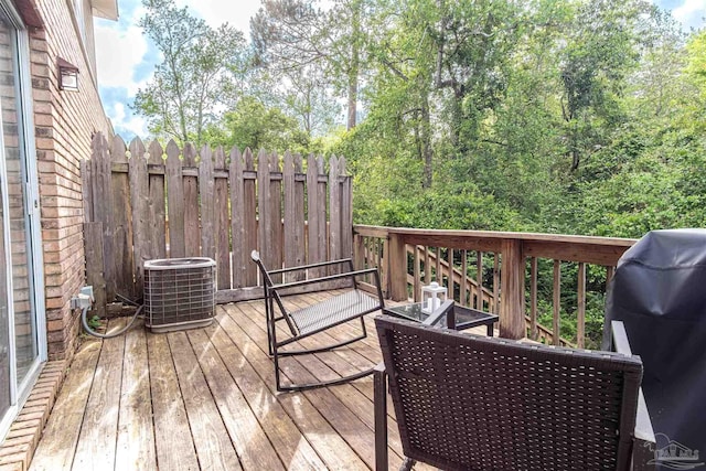 1314 Foxborough Dr, Pensacola, FL 32514 - wooden deck with area for grilling and cooling unit