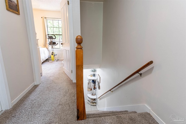 1314 Foxborough Dr, Pensacola, FL 32514 - hallway featuring carpet floors, an upstairs landing, and baseboards