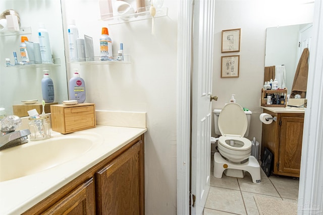 1314 Foxborough Dr, Pensacola, FL 32514 - bathroom with tile patterned flooring, toilet, and vanity