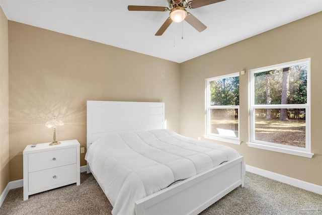 bedroom featuring ceiling fan and carpet floors