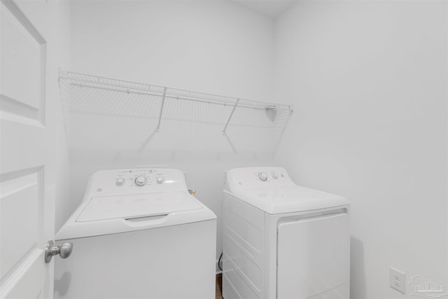 laundry area with washer and dryer