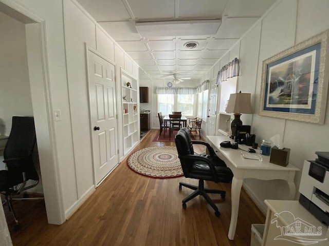 office with hardwood / wood-style flooring