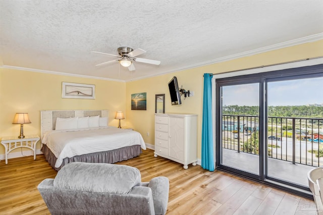 bedroom featuring ceiling fan, light wood-type flooring, access to outside, and ornamental molding