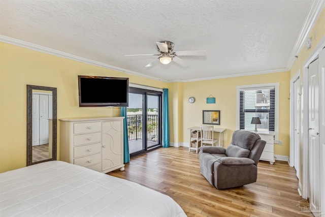 bedroom featuring wood finished floors, a textured ceiling, access to exterior, and ornamental molding