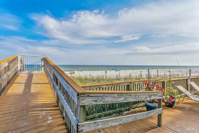 surrounding community featuring a water view