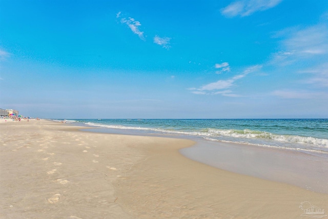 property view of water featuring a beach view