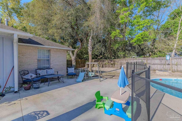 view of patio with a fenced backyard and an outdoor hangout area