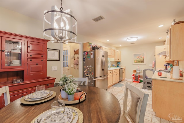dining space featuring visible vents, recessed lighting, a chandelier, and light tile patterned floors