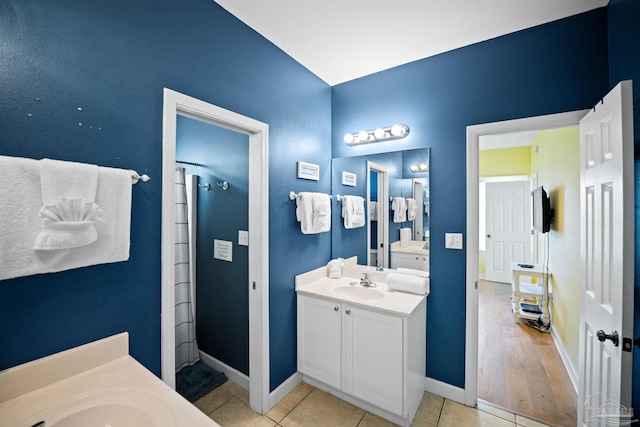 446 Harbor Light Cir, Gulf Shores, AL 36542 - full bath featuring vanity, baseboards, and tile patterned floors