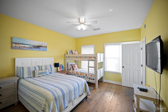 446 Harbor Light Cir, Gulf Shores, AL 36542 - bedroom featuring baseboards, wood-type flooring, and a ceiling fan