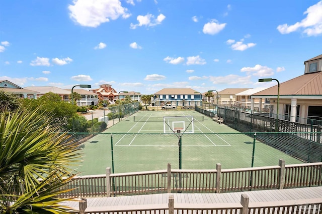 446 Harbor Light Cir, Gulf Shores, AL 36542 - view of tennis court with a residential view and fence