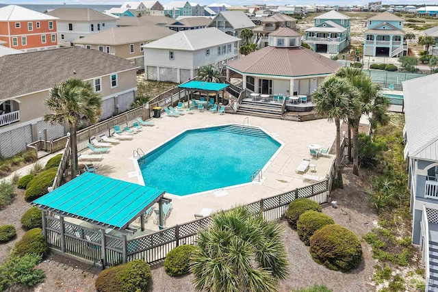 446 Harbor Light Cir, Gulf Shores, AL 36542 - community pool featuring fence, a patio, and a residential view