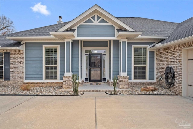 entrance to property featuring a garage