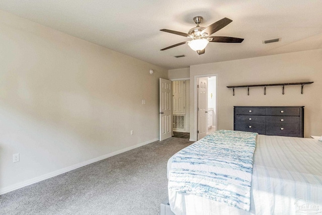 unfurnished bedroom with carpet flooring, connected bathroom, and ceiling fan