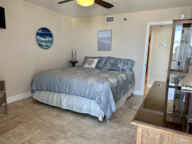 bedroom with visible vents, ceiling fan, and baseboards